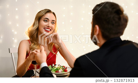 Absolutely In Love. Affectionate Woman Looking At Her Boyfriend With Adorance On Romantic Date In Restaurant, Selective Focus 132871913