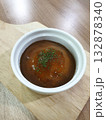Mashed Potato in white bowl on old wooden plate. 132878340