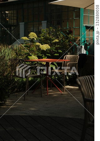 Prague Garden Cafe Table in Summer Light Prague Garden Cafe Table in Summer Light 132880038
