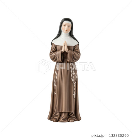 Porcelain figurine of a praying nun in a traditional habit a religious christian statuette 132880290