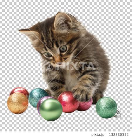 Cute Kitten Plays With Shiny Ornaments During Holiday Season. Cute Kitten Plays With Shiny Ornaments During Holiday Season. 132880552