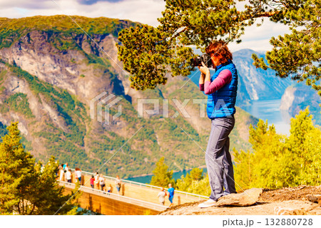 Tourist on nature take travel picture, Norway Tourist on nature take travel picture, Norway 132880728
