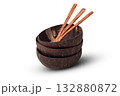 Stack of Natural Coconut Shell Bowls With Wooden Spoons 132880872