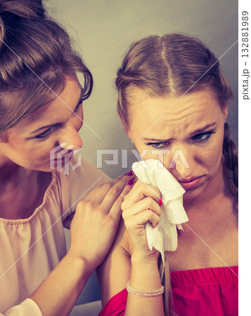 Friend comforting sad woman Friend comforting sad woman 132881989