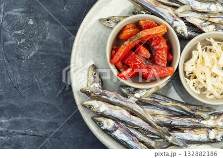 Unfiltered beer and with dried fish and squid. Unfiltered beer and with dried fish and squid. 132882186