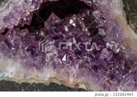 Amethyst Crystal Druse macro mineral on white background Amethyst Crystal Druse macro mineral on white background 132882465