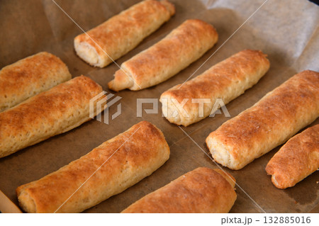 Homemade cookies in a roll on parchment paper 132885016