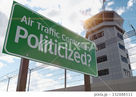 Air Traffic Controllers Politicized Green Road Sign In Front of Air Traffic Control Tower. Air Traffic Controllers Politicized Green Road Sign In Front of Air Traffic Control Tower. 132886511