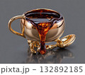 cup of tea sculpture, porcelain cup forged from polished bronze, liquid made of amber crystal, reflective shiny surface  132892185
