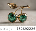 cherries sculpture forged from bronze, polished shiny surface, emerald green gemstone leaves, minimal clean backdrop  132892226