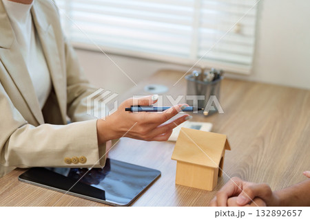 Real Estate Agent Explaining Property Details to Client 132892657
