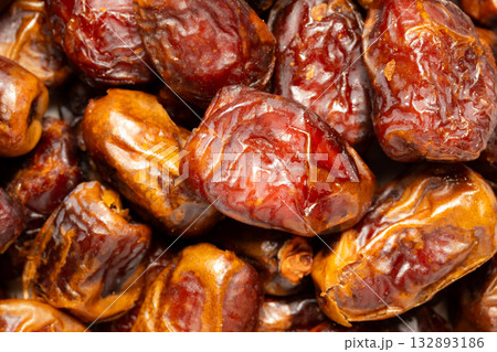 Heap of dried dates fruit. Top view 132893186