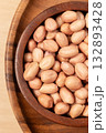 Raw Peanut in wooden bowl. Top view 132893428