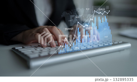 Business professional analyzes data and visualizes financial performance with modern keyboard and digital graph in contemporary office setting Scalp 132895335