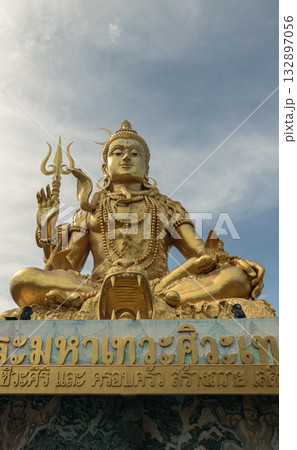a large golden statue of Lord Shiva is a major deity in Hinduism. 132897056