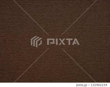 The warm, rich brown texture of this paper exudes an earthy, grounded presence with its organic feel 132902234