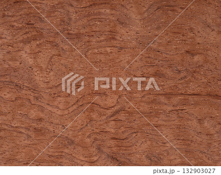 Bubinga pommele veneer with undulating grain patterns and warm terracotta tones Bubinga pommele veneer with undulating grain patterns and warm terracotta tones 132903027