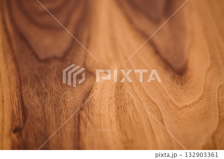 Closeup of real black walnut wood texture with natural grain Closeup of real black walnut wood texture with natural grain 132903361