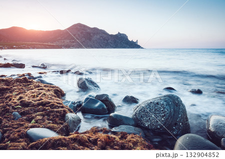 Blue sea in the morning light. Location place Black Sea, Crimea. Blue sea in the morning light. Location place Black Sea, Crimea. 132904852