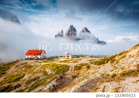 Great foggy view of the National park Tre Cime di Lavaredo. Location Dolomiti alps, Italy, 132905013
