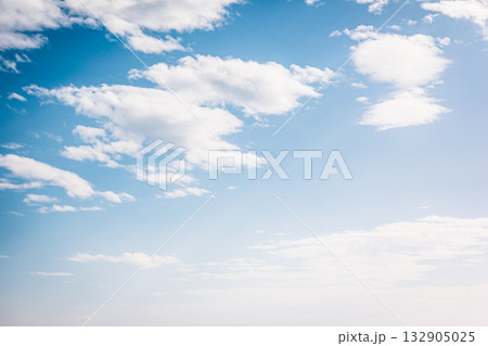 Fantastic view of the azure sky on a sunny day with fluffy clouds. 132905025