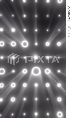 Abstract geometric grid of glowing white circles emitting radiant beams on a dark background 132905721