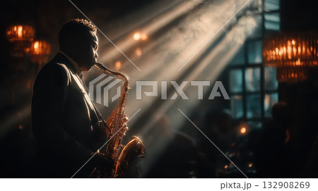 Dramatic Jazz Musician Playing Saxophone Under Soft Stage Light 132908269