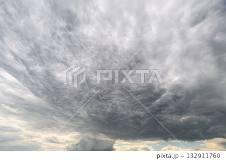 An EyeCatching Dramatic Cloud Formation Beneath A Gloomy Overcast Sky With Dynamic Elements 132911760