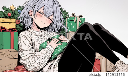 クリスマスプレゼントをたくさんもらって大喜びの若い女性