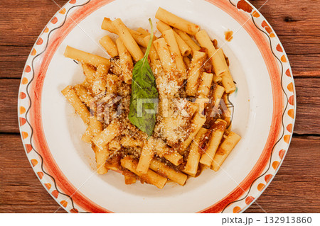 Naples Pasta Genovese a traditional Italian dish served on a decorative plate 132913860