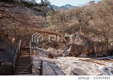 Wooden bridge and rocky stairs in Seoraksan National Park, Sokcho, South Korea Wooden bridge and rocky stairs in Seoraksan National Park, Sokcho, South Korea 132914801