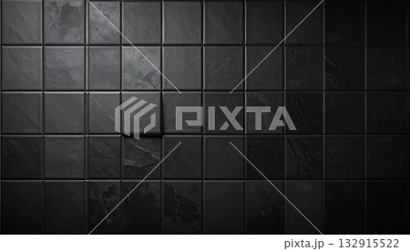 黒い四角いタイルが並んだ壁または床のテクスチャ。大理石風重厚感のあるかっこいいスタイリッシュ背景素材 132915522