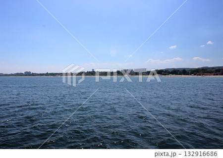 Sopot beach and city skyline viewed from the sea on sunny day 132916686