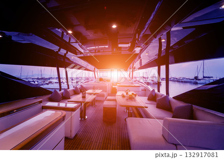 View of harbor with yachts details. Beautiful sunset sky in the marina bay. 132917081