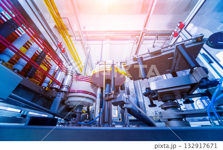 Automatic labeling machine during operation. Factory for the production  132917671