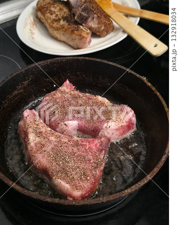 Pork Chops Sizzling: Realistic Cooking Scene Pork Chops Sizzling: Realistic Cooking Scene 132918034