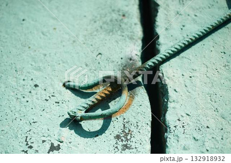 Turquoise painted wall with a metal element. Background image. Grunge. Turquoise painted wall with a metal element. Background image. Grunge. 132918932