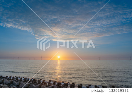 Sunset seascape at Miaoli with wind turbines in Taiwan. Sunset seascape at Miaoli with wind turbines in Taiwan. 132919551