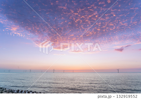 Stunning Sunset over Houlong Beach in Miaoli County Taiwan with Wind Turbines. 132919552