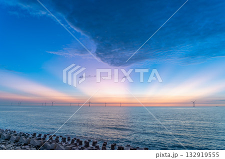 Sunset seascape at Miaoli with wind turbines in Taiwan. Sunset seascape at Miaoli with wind turbines in Taiwan. 132919555
