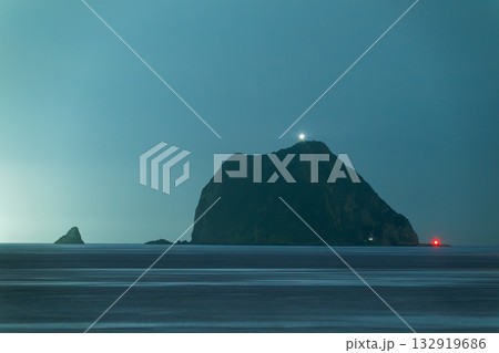 Keelung Island Lighthouse Night View Taiwan Blue Ocean Cinematic Long Exposure. Keelung Island Lighthouse Night View Taiwan Blue Ocean Cinematic Long Exposure. 132919686