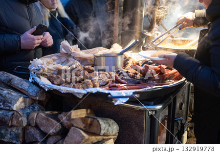 sausage on the grill in the city center at the Christmas market in Riga Latvia 132919778