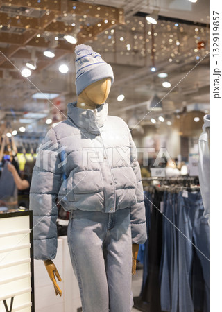 mannequins on display in a store with clothes in a shopping center 132919857