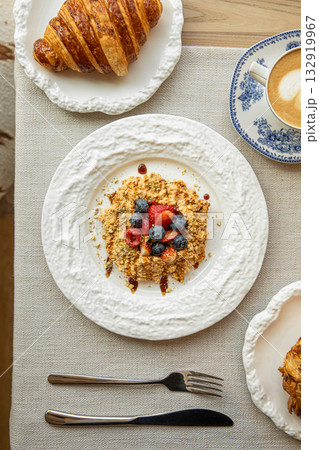 Oatmeal with berries and honey for breakfast Oatmeal with berries and honey for breakfast 132919967