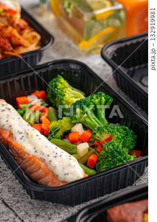 Salmon with vegetables in meal prep box Salmon with vegetables in meal prep box 132919981