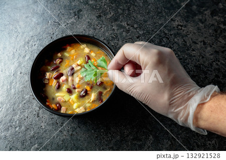 Red bean soup with potatoes, tomatoes, paprika, carrot, and bacon. 132921528