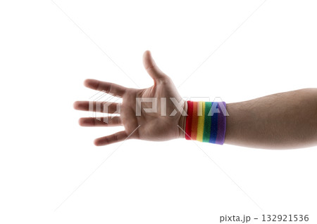Hand with colorful rainbow LGBT wristband isolated on white background with clipping path Hand with colorful rainbow LGBT wristband isolated on white background with clipping path 132921536
