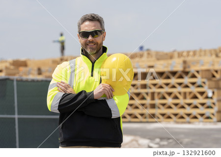 Labor day. Building side. Heavy machine operator. Industry worker at construction. Builder civil engineer at building. Supervisor engineer. Worker at construction site. Advertisement 132921600