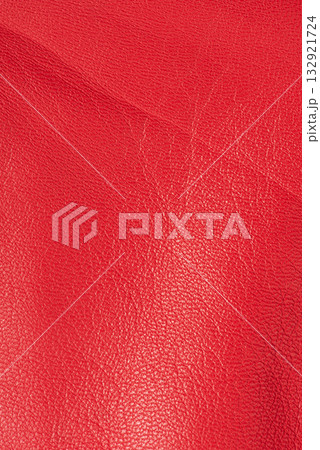Natural leather dyed red macro photo as a background. Natural leather dyed red macro photo as a background. 132921724