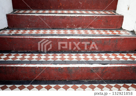 Vintage Red and White Tiled Staircase Pattern. Architectural detail, symmetry, and classic design 132921858
